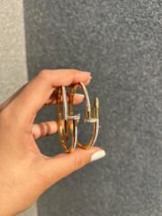 Golden nail handcuff